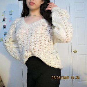 White loose-knit wool sweater